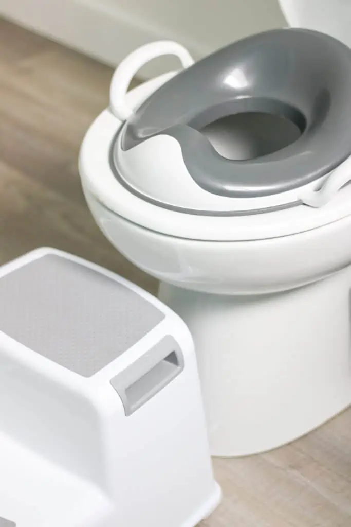 toilet seat reducer on toilet and step stool