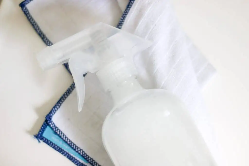 glass spray bottle and cloth
