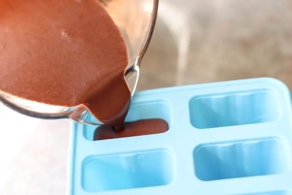 pouring batter into molds