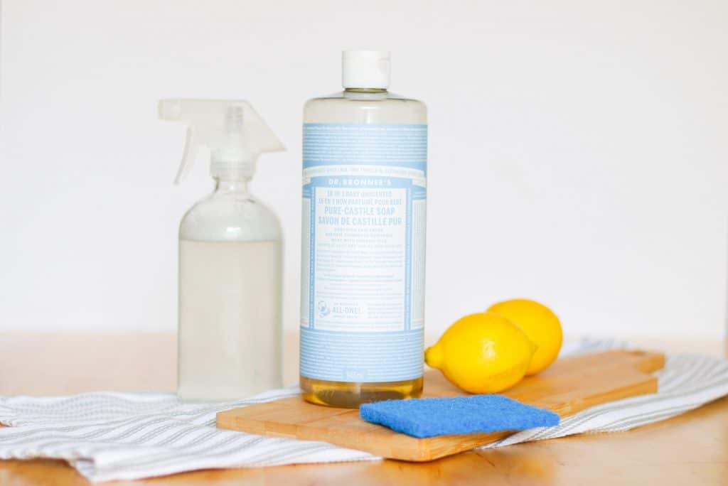 castile soap, spray bottle and scrubber