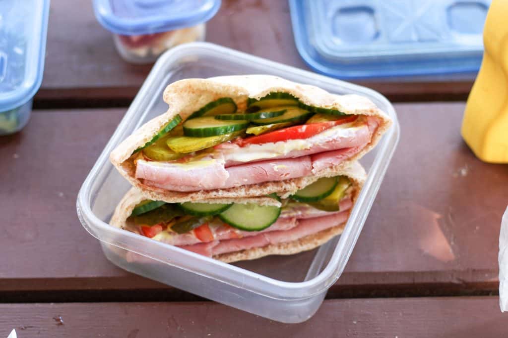 pita sandwiches in a container