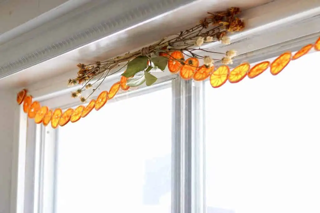 orange garland above window