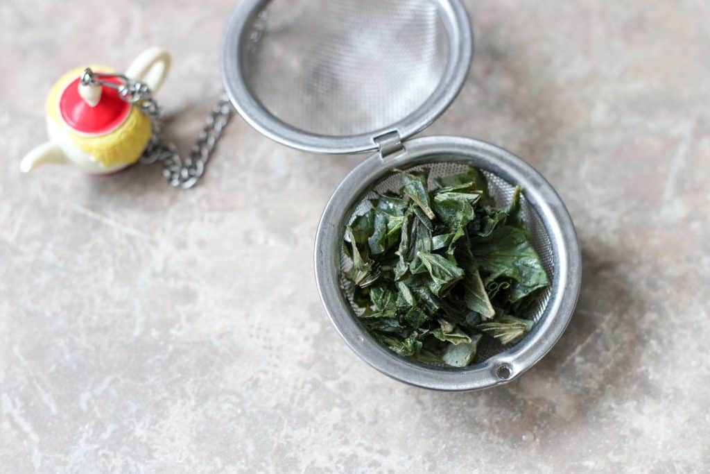 Fresh mint leaves in a tea ball