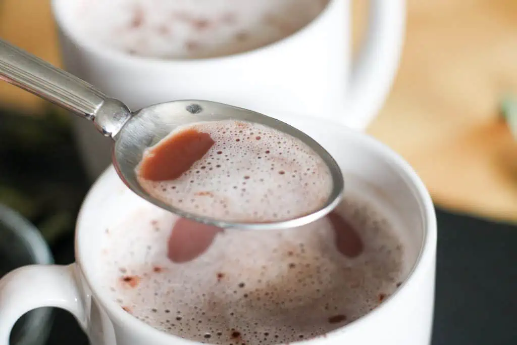 spoon of chocolate mint tea latte