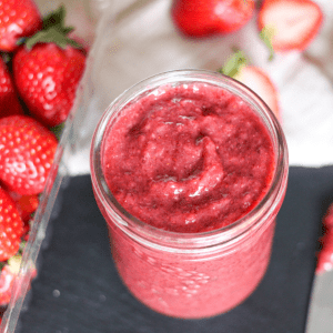 jar of strawberry jam and fresh strawberries
