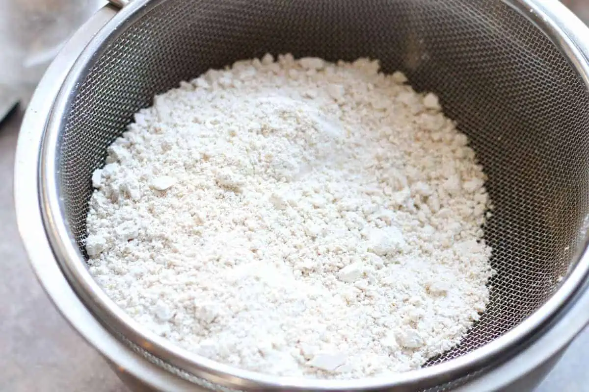 oat flour in a sieve