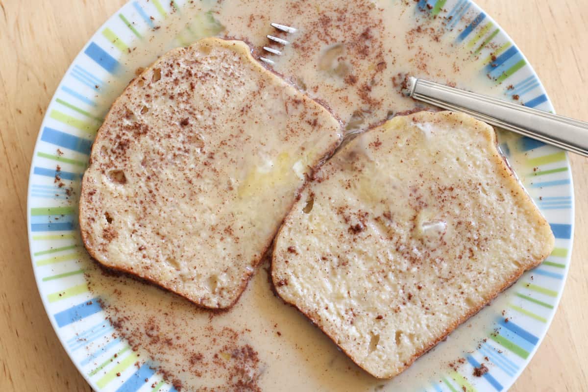 bread slices soaking in egg mixture