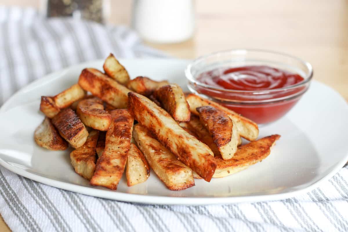 plate of french fries and dish of ketchup