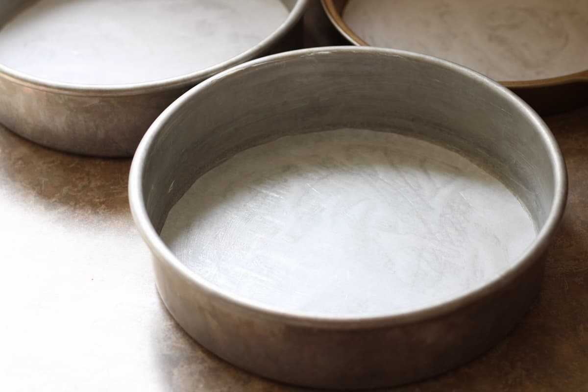 cake pans greased and lined with parchment paper