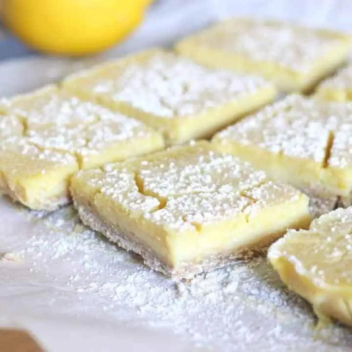 square lemon bars dusted with powdered sugar