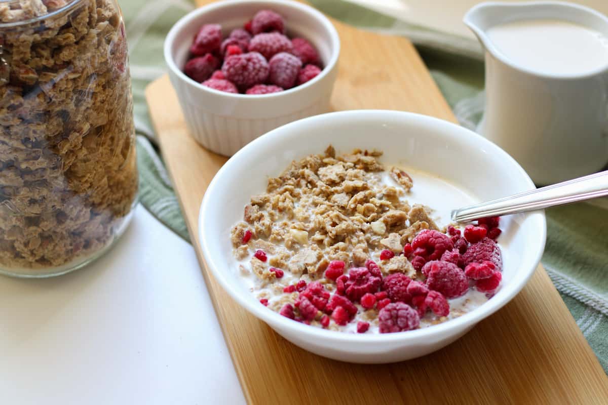 bowl of granola and raspberries