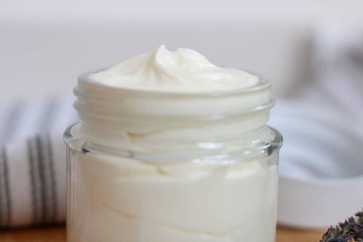 side view of full jar of tallow balm