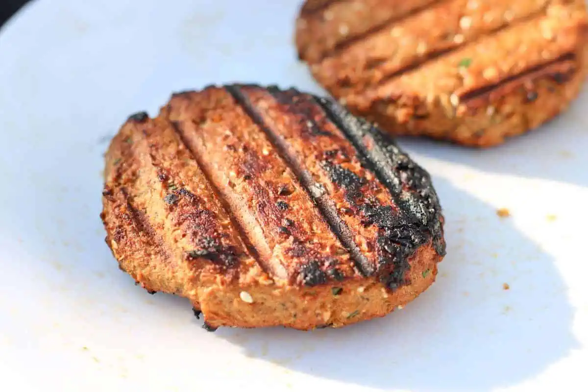 grilled salmon burgers on a plate