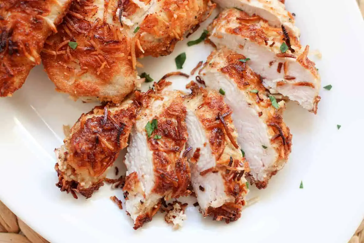 sliced fried chicken breast on a plate