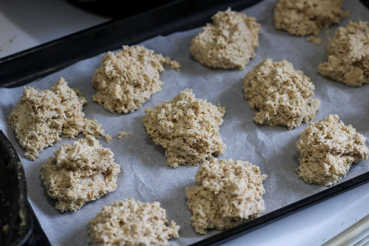 mounds of biscuit dough on baking sheet