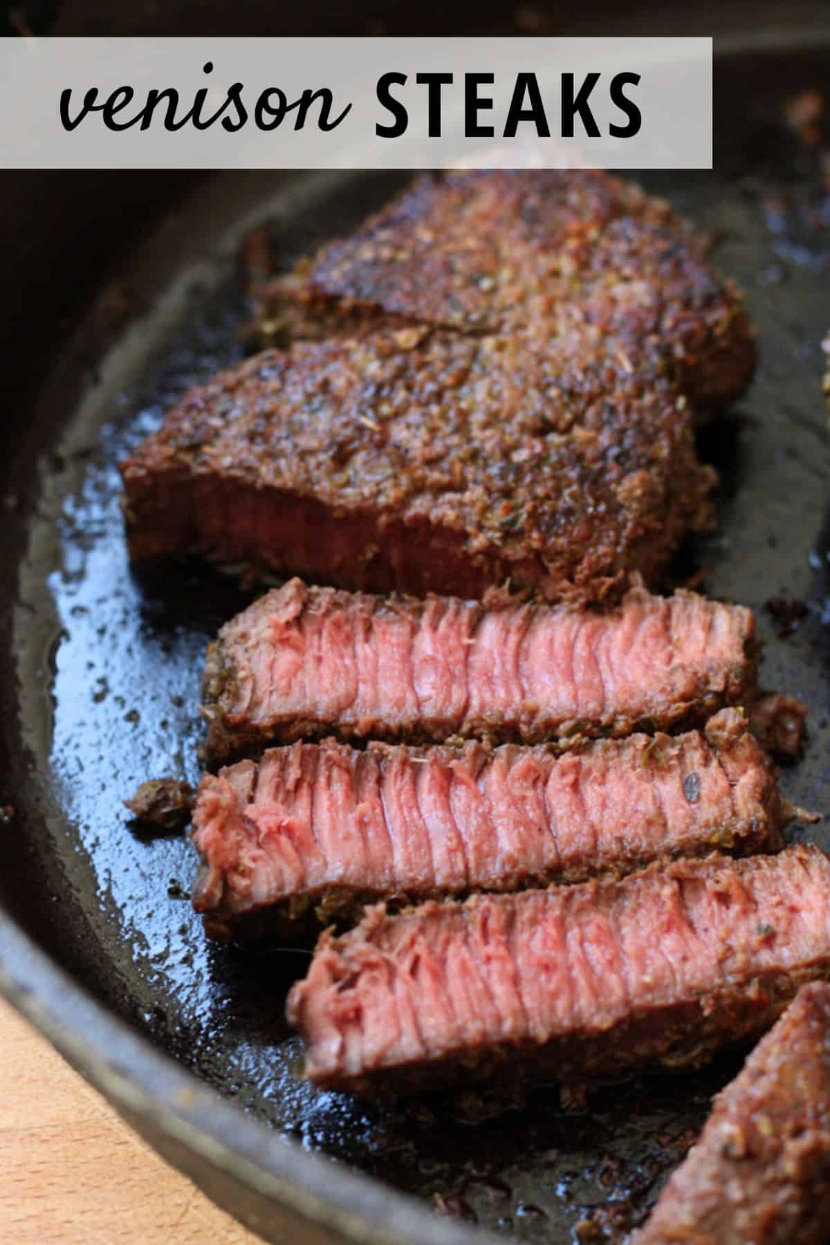 venison steak sliced in a pan