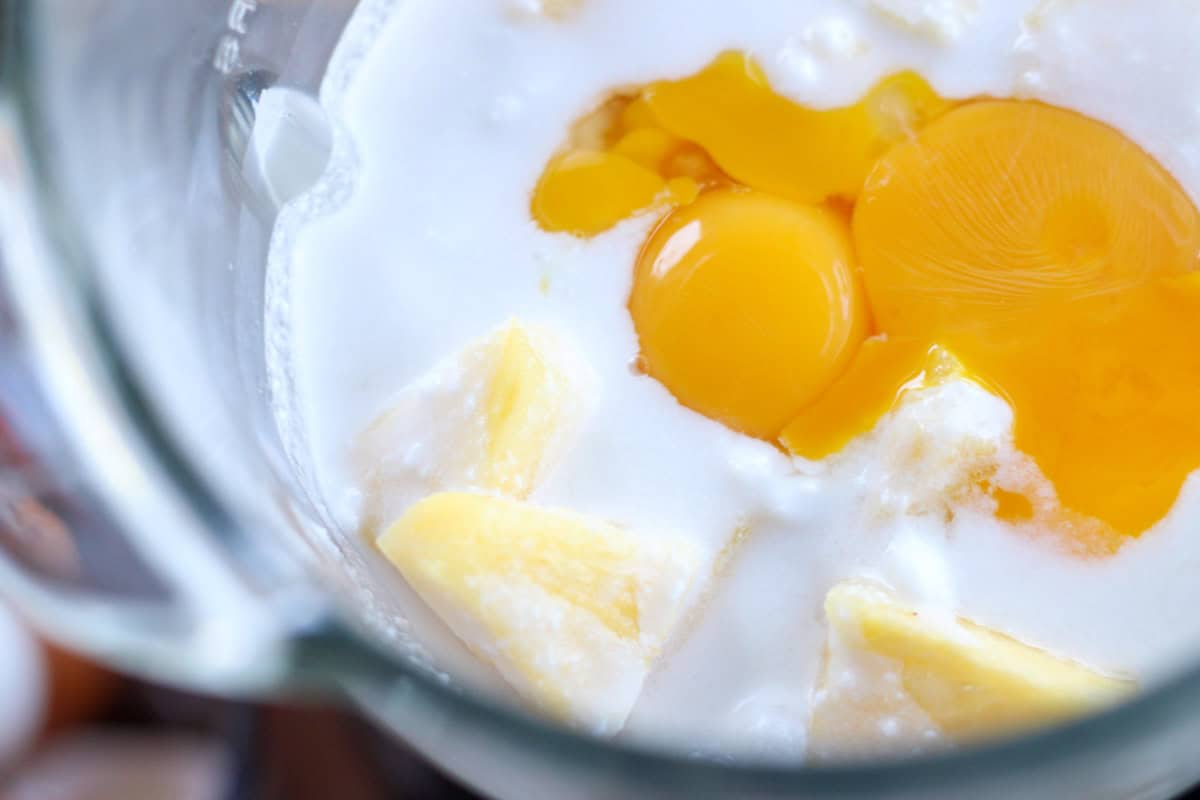pineapple ice cream ingredients in blender before blending